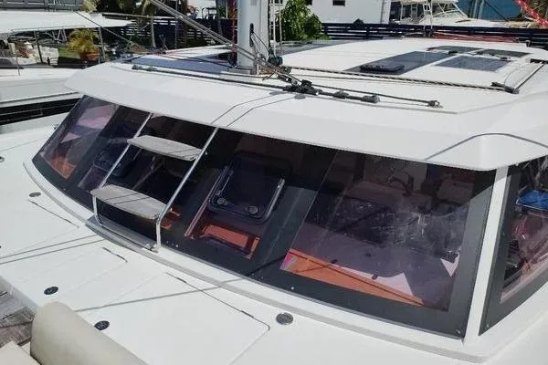 Susie Sea Yacht Photos Pics 2019 Nautitech 46 Open catamaran with sleek windows and modern design.