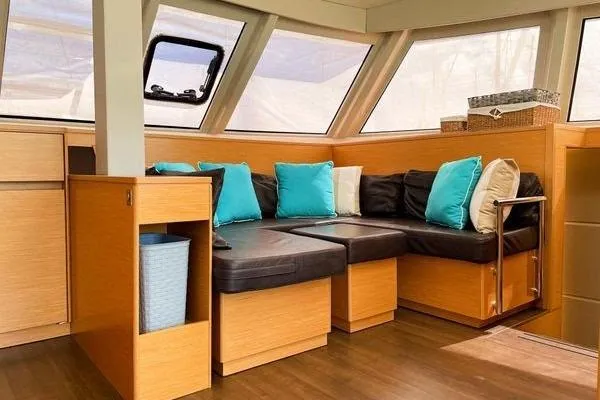 Susie Sea Yacht Photos Pics Luxurious interior of 2019 Nautitech 46 Open catamaran with modern seating and cushions.
