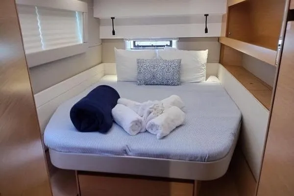 Susie Sea Yacht Photos Pics Cozy bedroom in 2019 Nautitech 46 Open yacht with neatly arranged linens.