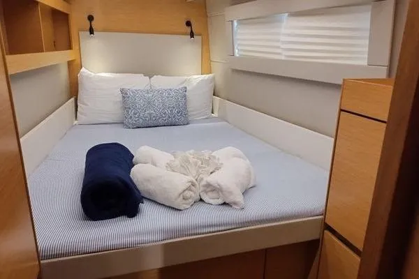 Susie Sea Yacht Photos Pics Cozy bedroom in 2019 Nautitech 46 Open yacht with neatly arranged towels and pillows.