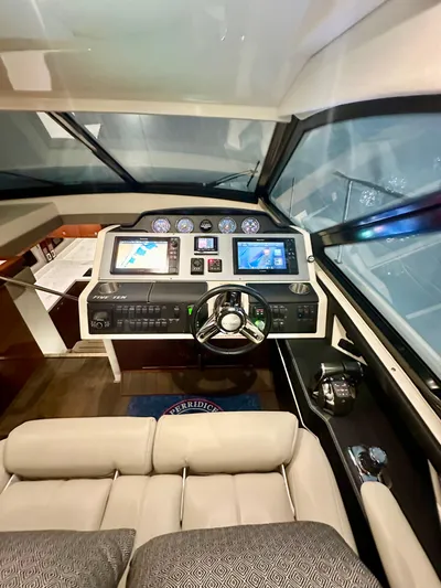 Perridice Yacht Photos Pics 2017 Sea Ray Sundancer 510 helm with modern navigation displays and luxurious seating.