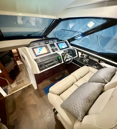 Perridice Yacht Photos Pics 2017 Sea Ray Sundancer 510 helm with modern controls and plush seating.