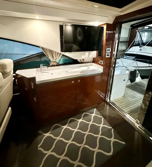 Perridice Yacht Photos Pics Luxurious interior of 2017 Sea Ray Sundancer 510 yacht with modern amenities and elegant design.