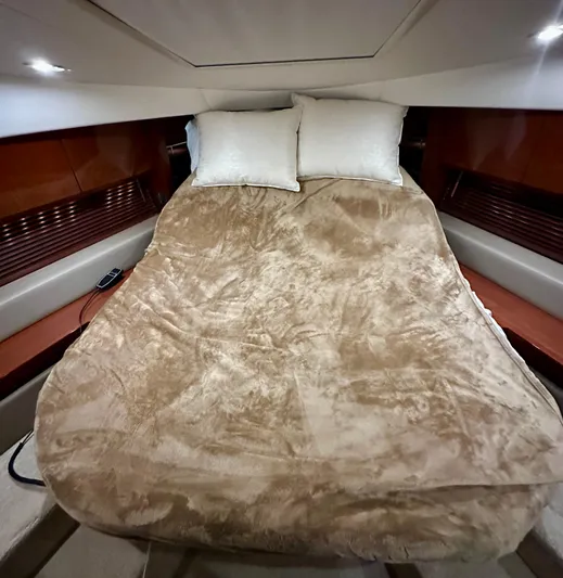 Perridice Yacht Photos Pics Luxurious bedroom interior of 2017 Sea Ray Sundancer 510 yacht with plush bedding.