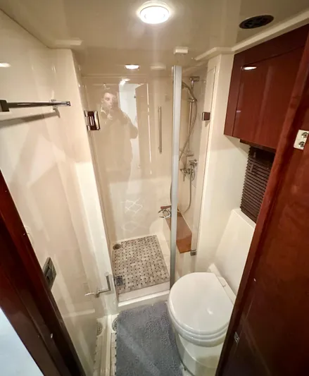 Perridice Yacht Photos Pics Luxurious bathroom in 2017 Sea Ray Sundancer 510 yacht with shower and toilet.