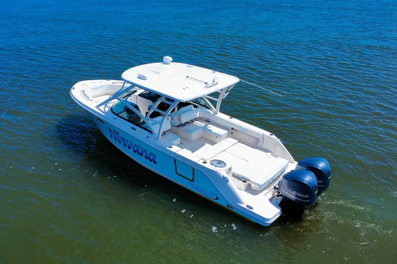  Yacht Photos Pics 2019 Robalo R317 Dual Console boat on water with twin Yamaha engines.