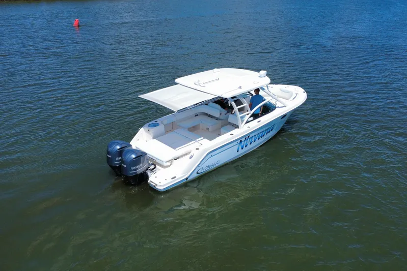  Yacht Photos Pics 2019 Robalo R317 Dual Console boat on water, featuring twin Yamaha engines.
