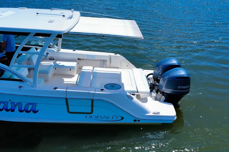  Yacht Photos Pics 2019 Robalo R317 Dual Console boat with twin Yamaha engines on water.