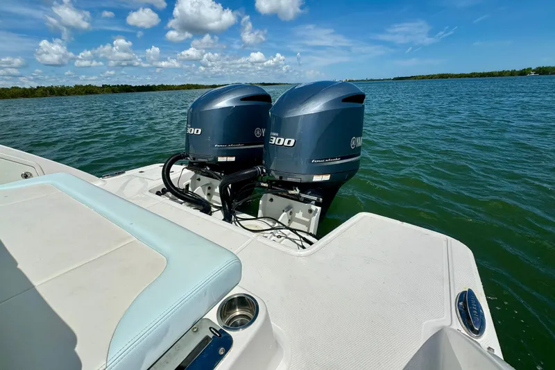  Yacht Photos Pics 2019 Robalo R317 Dual Console with twin Yamaha 300 engines on open water.