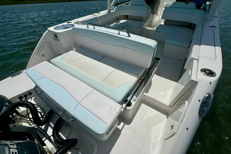  Yacht Photos Pics 2019 Robalo R317 Dual Console boat interior with seating and water view.