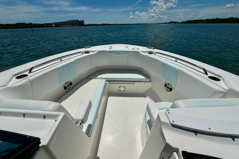  Yacht Photos Pics 2019 Robalo R317 Dual Console boat interior with spacious seating on calm water.