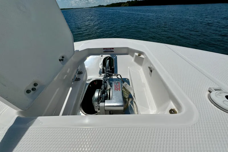  Yacht Photos Pics 2019 Robalo R317 Dual Console boat anchor compartment on open water.