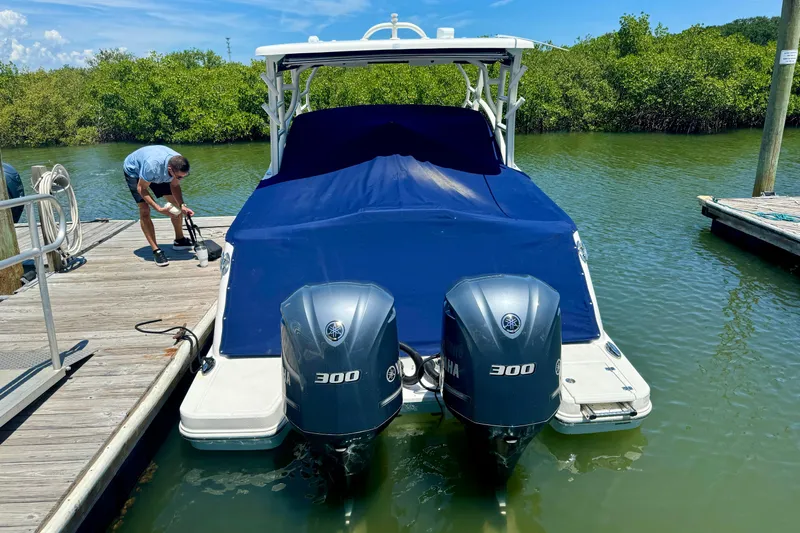  Yacht Photos Pics 2019 Robalo R317 Dual Console boat docked with twin Yamaha 300 engines.