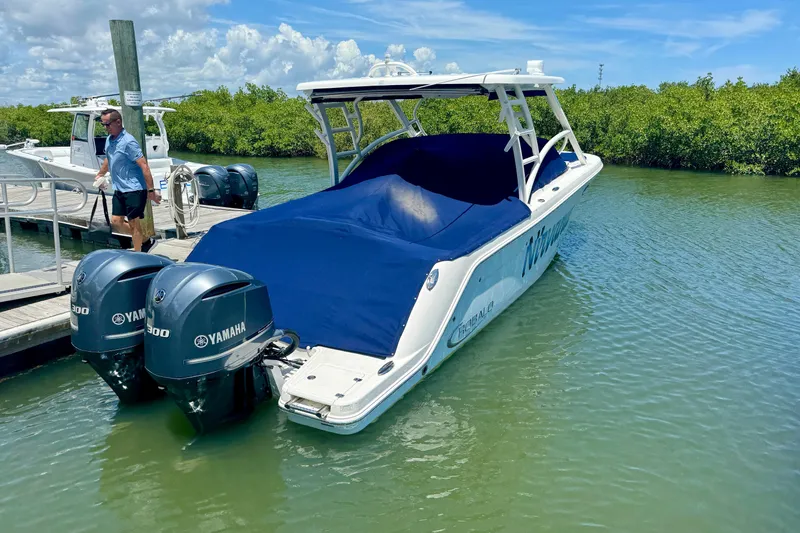  Yacht Photos Pics 2019 Robalo R317 Dual Console boat docked with Yamaha engines.