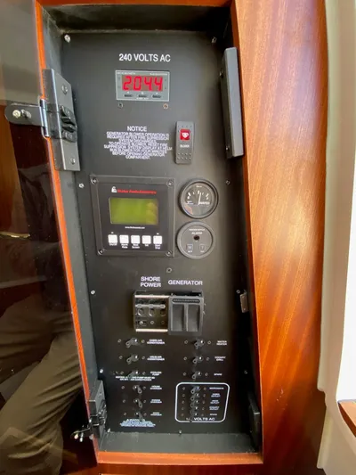  Yacht Photos Pics Electrical panel of 2022 Pursuit 378S boat, displaying 240 volts AC.