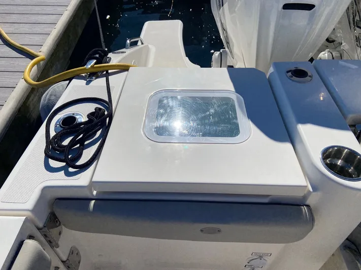  Yacht Photos Pics 2022 Pursuit 378S boat deck with rope and cup holders.