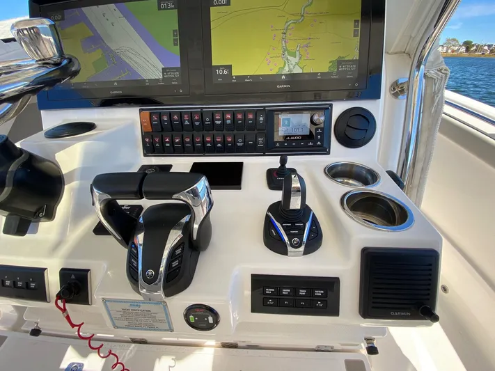  Yacht Photos Pics Helm of 2022 Pursuit 378S boat with Garmin navigation and control systems.