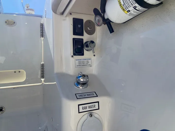  Yacht Photos Pics Control panel on a 2022 Pursuit 378S boat with water system labels.
