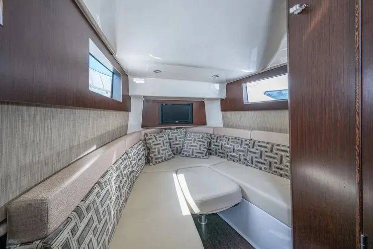 Raison D'&Ecirc;tre Yacht Photos Pics Interior of 2022 Pursuit S 378 Sport with elegant upholstery.