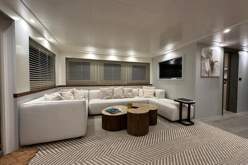  Yacht Photos Pics Luxurious interior of 2021 Terranova Yachts T85 with modern white sofa and stylish decor.
