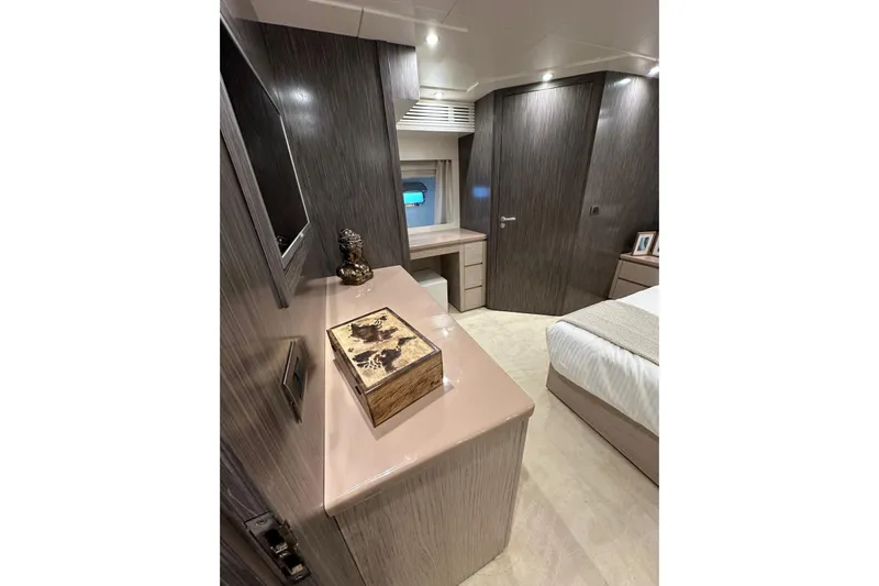 Yacht Photos Pics Luxurious interior of 2021 Terranova Yachts T85, featuring elegant wood finishes and modern decor.