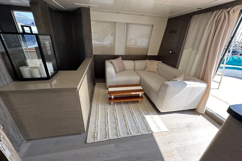  Yacht Photos Pics Luxurious interior of 2021 Terranova Yachts T85 with modern sofa and elegant decor.