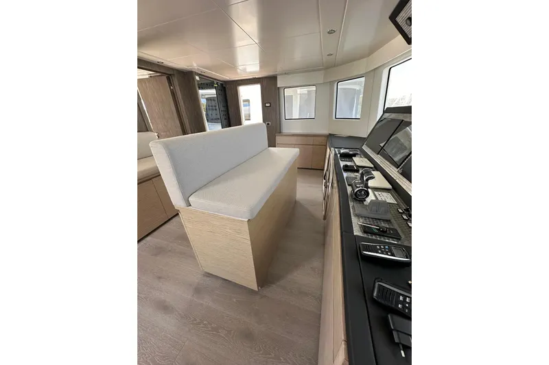  Yacht Photos Pics Interior of 2021 Terranova Yachts T85, featuring modern helm and seating area.