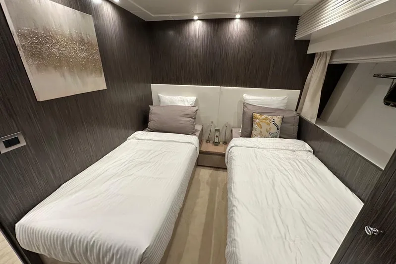  Yacht Photos Pics Luxurious 2021 Terranova Yachts T85 cabin with twin beds and modern decor.