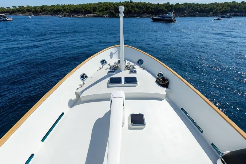  Yacht Photos Pics Bow view of 2021 Terranova Yachts T85 on serene blue waters.