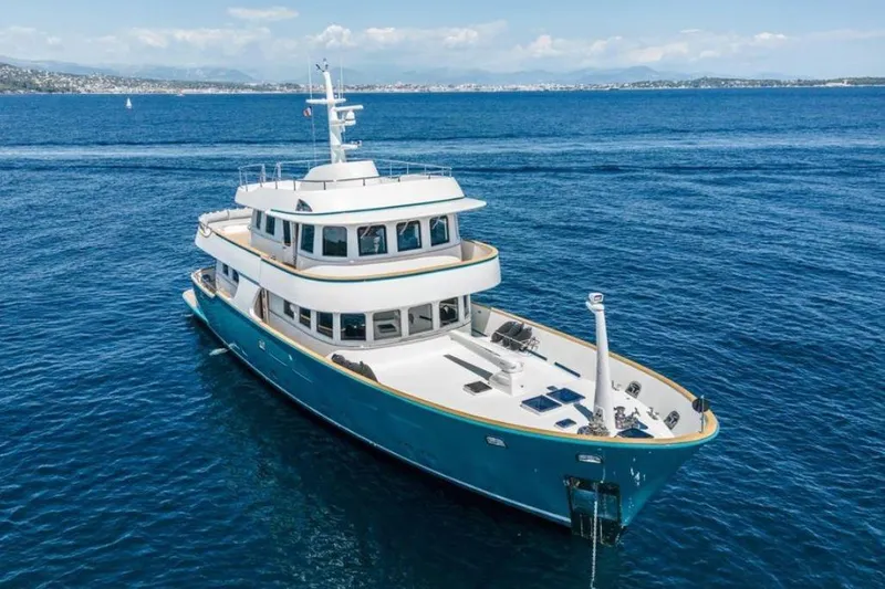  Yacht Photos Pics Terranova Yachts T85 2021 model cruising on open sea, showcasing elegant design.