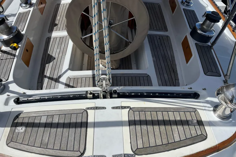 Wind Star Yacht Photos Pics Cockpit of 1986 Liberty 49 sailboat with wooden flooring and winches.