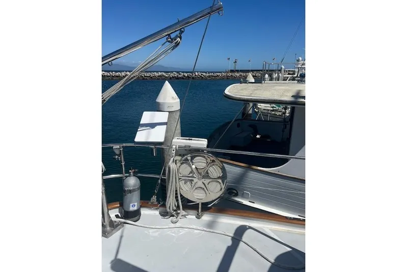 Wind Star Yacht Photos Pics 1986 Liberty 49 yacht docked at marina with clear blue sky.