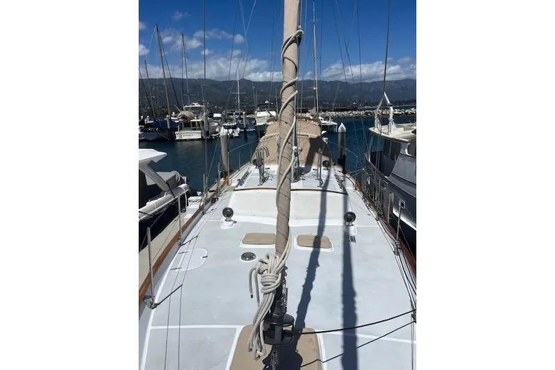 Wind Star Yacht Photos Pics Sailboat deck view of 1986 Liberty 49 model in a marina setting.