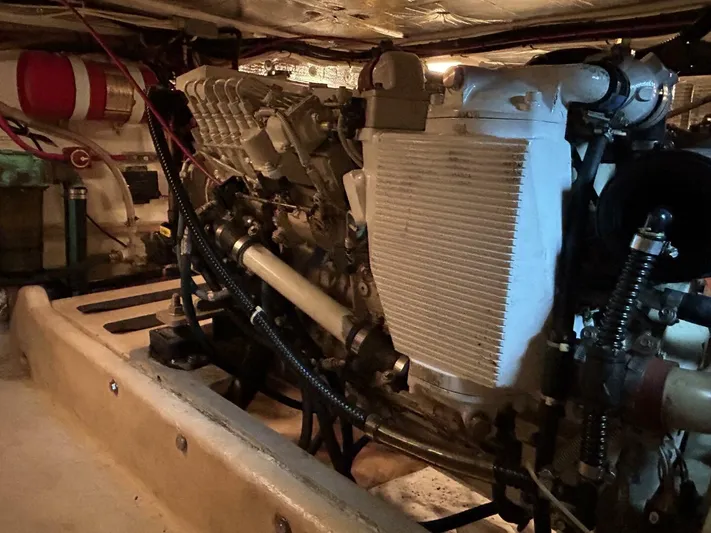 Hercules Yacht Photos Pics Engine room of a 2000 Nordic Tug 42 Millennium, showcasing mechanical components and wiring.