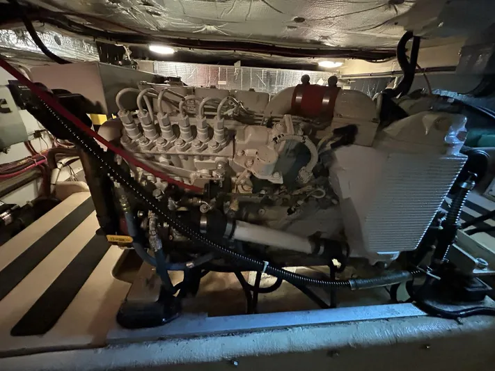 Hercules Yacht Photos Pics Engine room of a 2000 Nordic Tug 42 Millennium, showcasing detailed mechanical components.