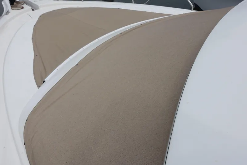  Yacht Photos Pics 2001 Silverton 410 Sport Bridge with beige canvas covers on deck.