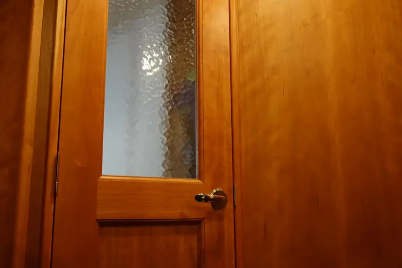  Yacht Photos Pics Wooden door with frosted glass panel on a 2001 Silverton 410 Sport Bridge.