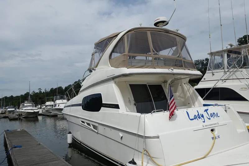  Yacht Photos Pics 2001 Silverton 410 Sport Bridge yacht docked at marina, named "Lady Jane."