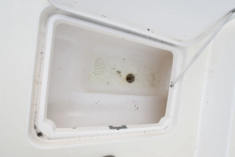 Series 60 Engines Yacht Photos Pics Empty storage compartment on 2006 Ocean 46 Super Sport boat.