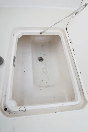 Series 60 Engines Yacht Photos Pics Open storage compartment on Ocean 46 Super Sport boat, 2006 model.