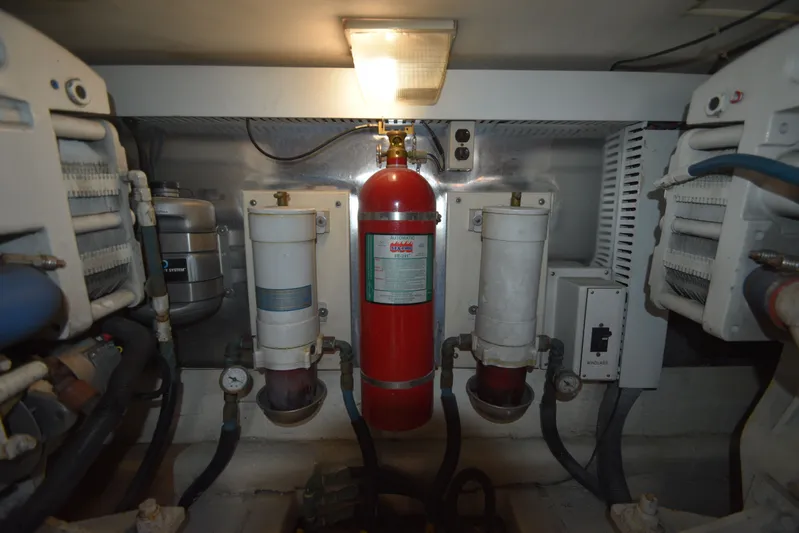 Series 60 Engines Yacht Photos Pics Engine room of 2006 Ocean 46 Super Sport with fire extinguisher.