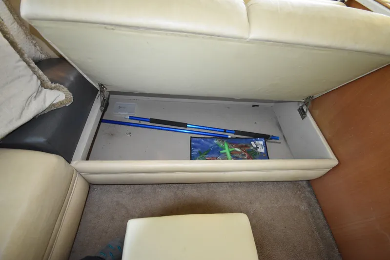 Series 60 Engines Yacht Photos Pics Storage compartment under seat in 2006 Ocean 46 Super Sport.