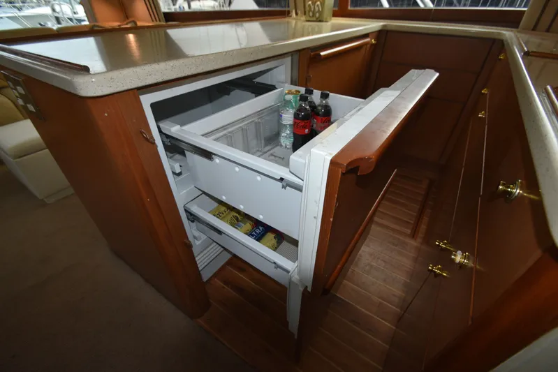 Series 60 Engines Yacht Photos Pics Ocean 46 Super Sport yacht kitchen with open fridge, 2006 model.