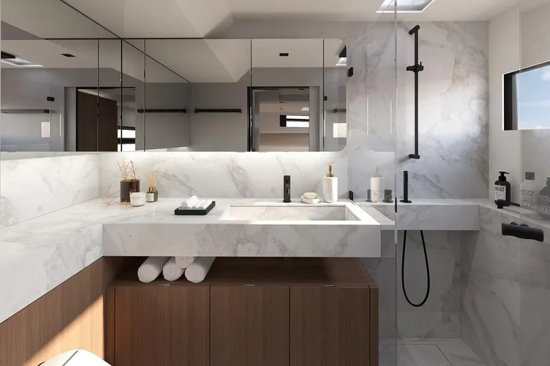  Yacht Photos Pics Luxurious modern bathroom on Simbad 55 yacht, 2025 model, featuring marble surfaces and sleek fixtures.