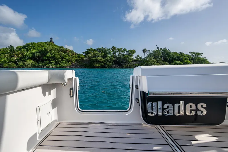 Kirby 107 Yacht Photos Pics 2014 Everglades 350LX boat with scenic island view in the background.