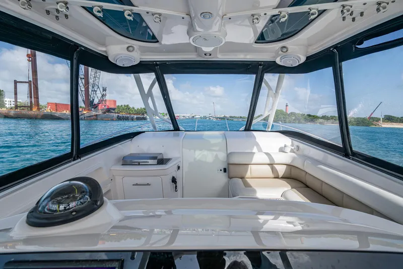 Kirby 107 Yacht Photos Pics Interior view of 2014 Everglades 350LX boat with scenic waterway background.