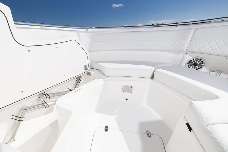  Yacht Photos Pics Manufacturer Provided Image: Spacious interior of 2025 Pursuit DC 326 Dual Console boat under clear blue sky.