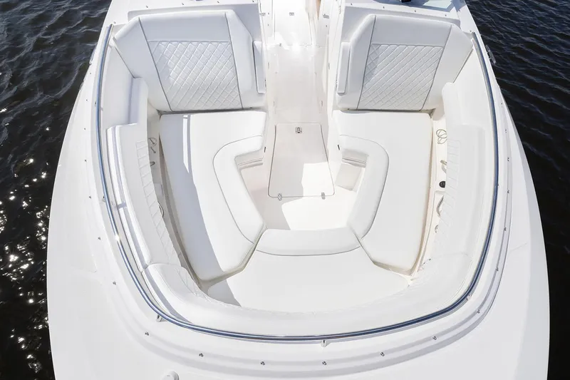  Yacht Photos Pics Manufacturer Provided Image: 2025 Pursuit DC 326 Dual Console boat with spacious white seating area.