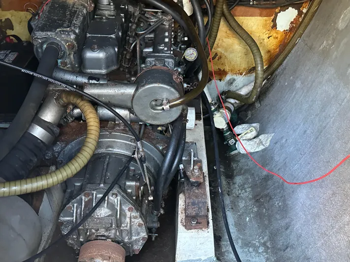 Bat Ha Yam Yacht Photos Pics Engine compartment of a 2001 Leopard 47 catamaran, showing mechanical components and wiring.