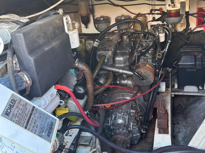 Bat Ha Yam Yacht Photos Pics Engine compartment of a 2001 Leopard 47 yacht, featuring various mechanical components.